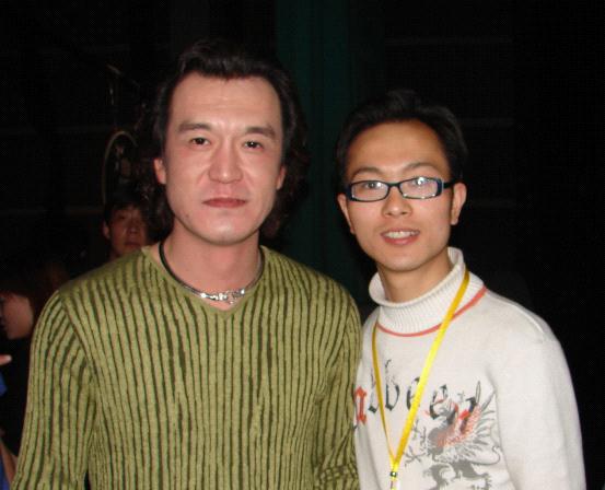 中央电视台着名主持人李咏与张书军 中央电视台着名主持人李咏与张书军